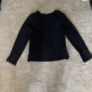 Black v neck blouse with lace detailing